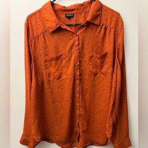 Orange button up shirt